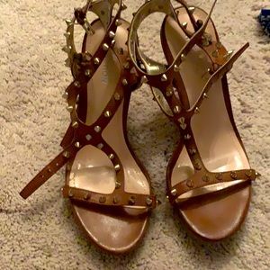 Brown shoes with gold studs